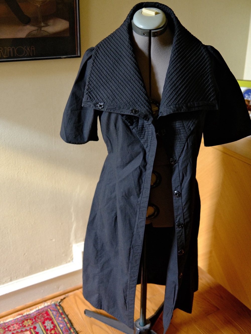 Silhouette Black Coat with Neutral Label Accents